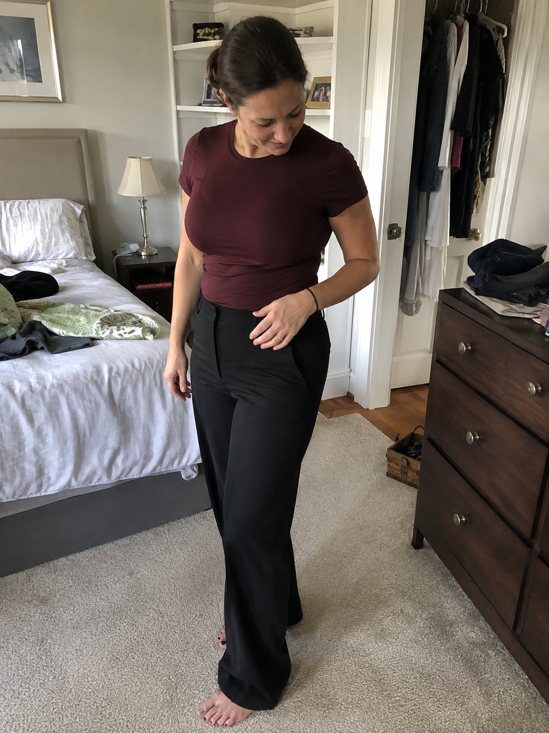Woman preparing for night out wearing Élan
